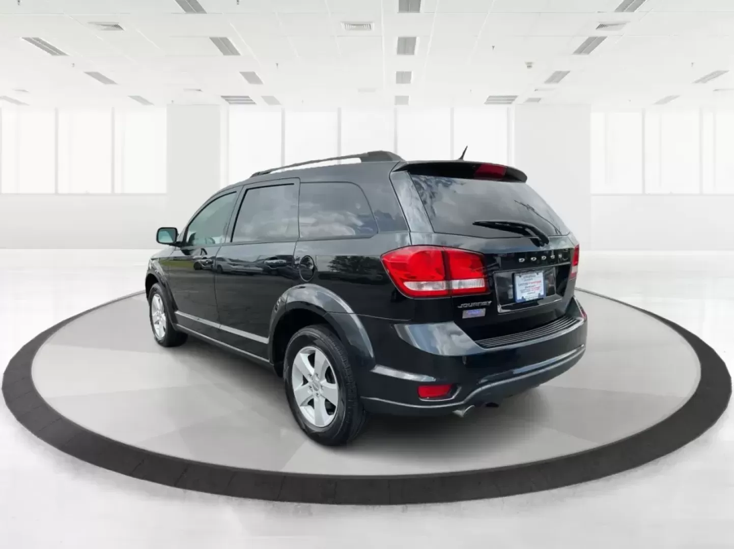 2012 Dodge Journey SXT (3C4PDCBG5CT) with an 2.4L I-4 DOHC engine, located at 401 Woodman Dr, Riverside, OH, 45431, (937) 908-9800, 39.760899, -84.123421 - 2012 Dodge Journey SXT - Photo#4