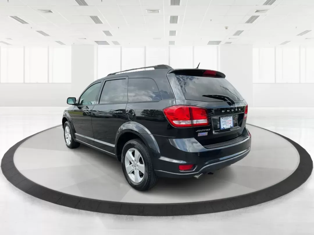 2012 Dodge Journey SXT (3C4PDCBG5CT) with an 2.4L I-4 DOHC engine, located at 401 Woodman Dr, Riverside, OH, 45431, (937) 908-9800, 39.760899, -84.123421 - Photo#4