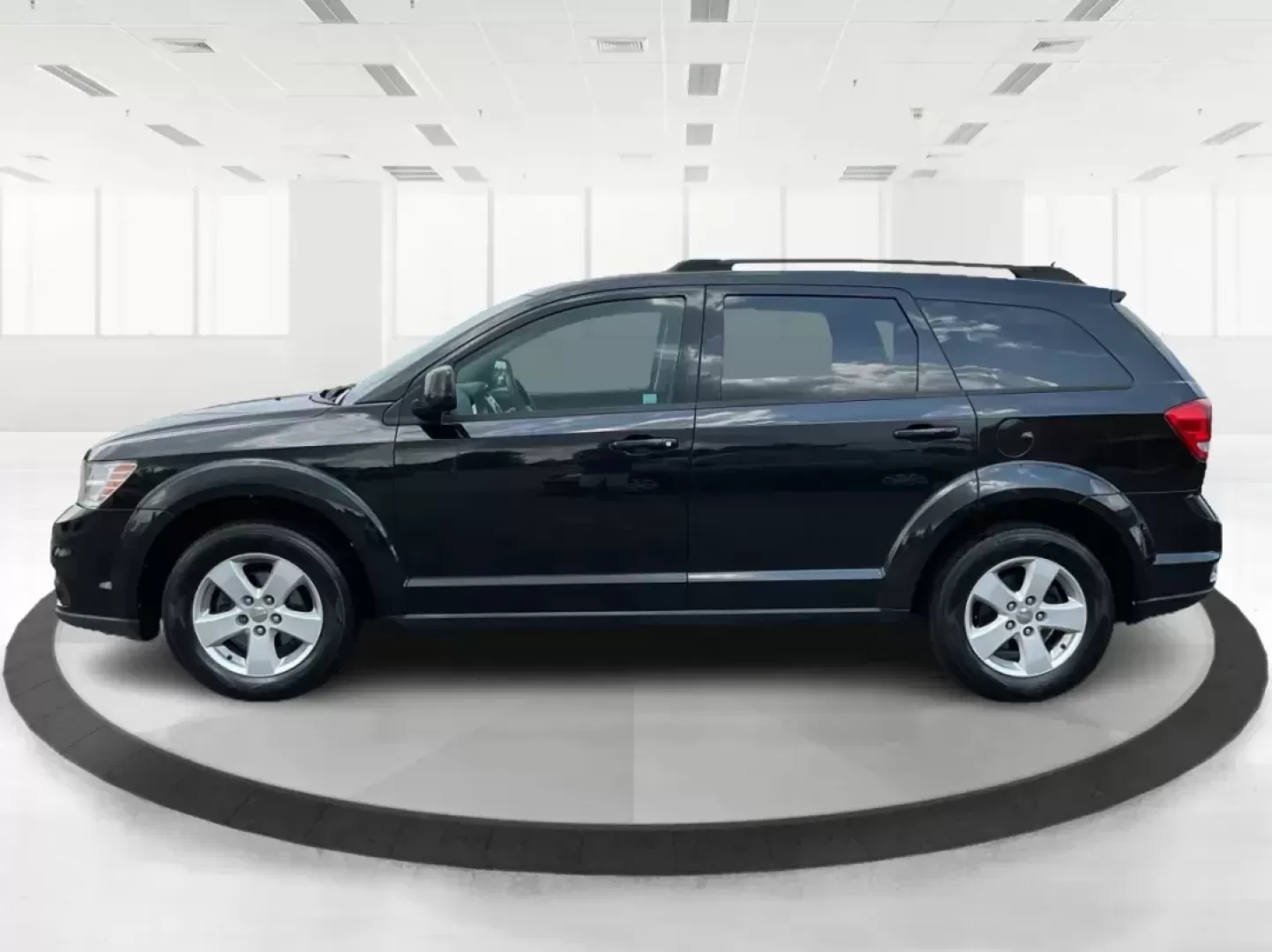 2012 Dodge Journey SXT (3C4PDCBG5CT) with an 2.4L I-4 DOHC engine, located at 401 Woodman Dr, Riverside, OH, 45431, (937) 908-9800, 39.760899, -84.123421 - 2012 Dodge Journey SXT - Photo#5