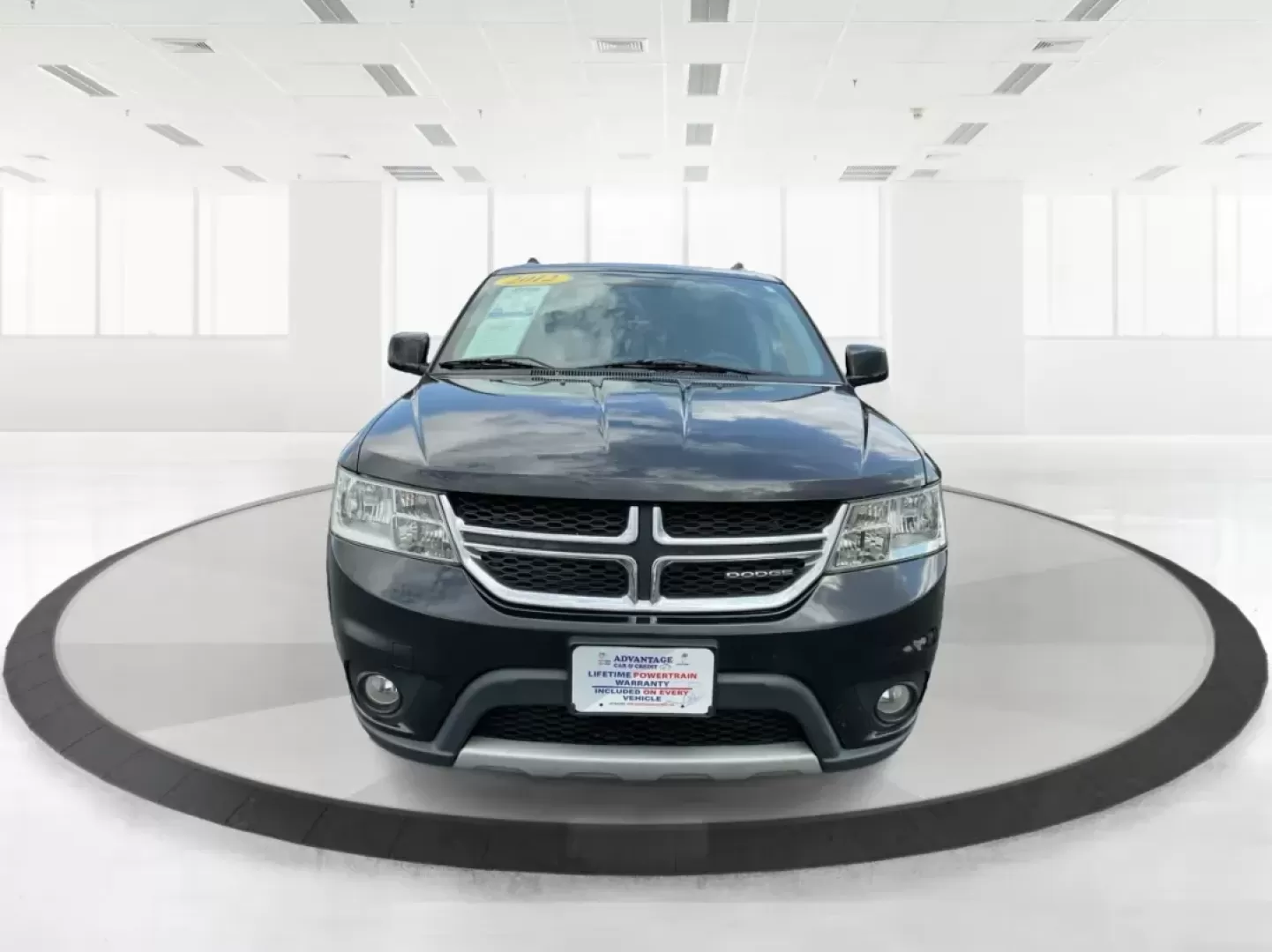 2012 Dodge Journey SXT (3C4PDCBG5CT) with an 2.4L I-4 DOHC engine, located at 401 Woodman Dr, Riverside, OH, 45431, (937) 908-9800, 39.760899, -84.123421 - 2012 Dodge Journey SXT - Photo#6