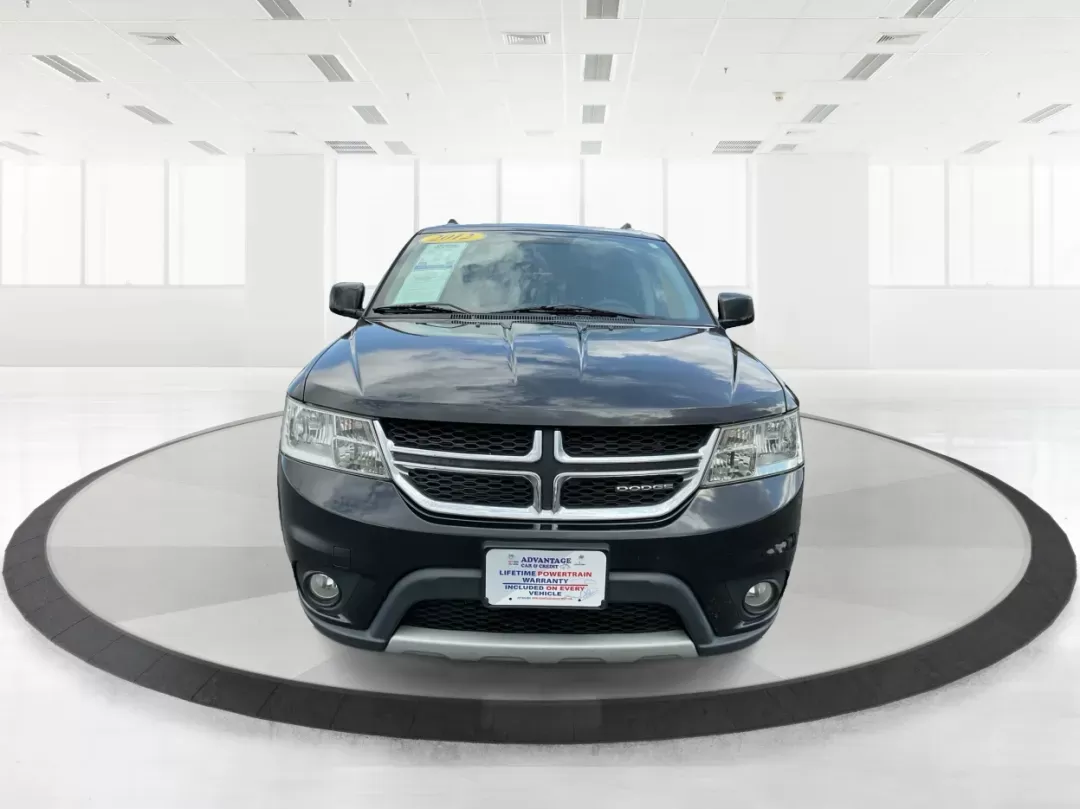 2012 Dodge Journey SXT (3C4PDCBG5CT) with an 2.4L I-4 DOHC engine, located at 401 Woodman Dr, Riverside, OH, 45431, (937) 908-9800, 39.760899, -84.123421 - Photo#6