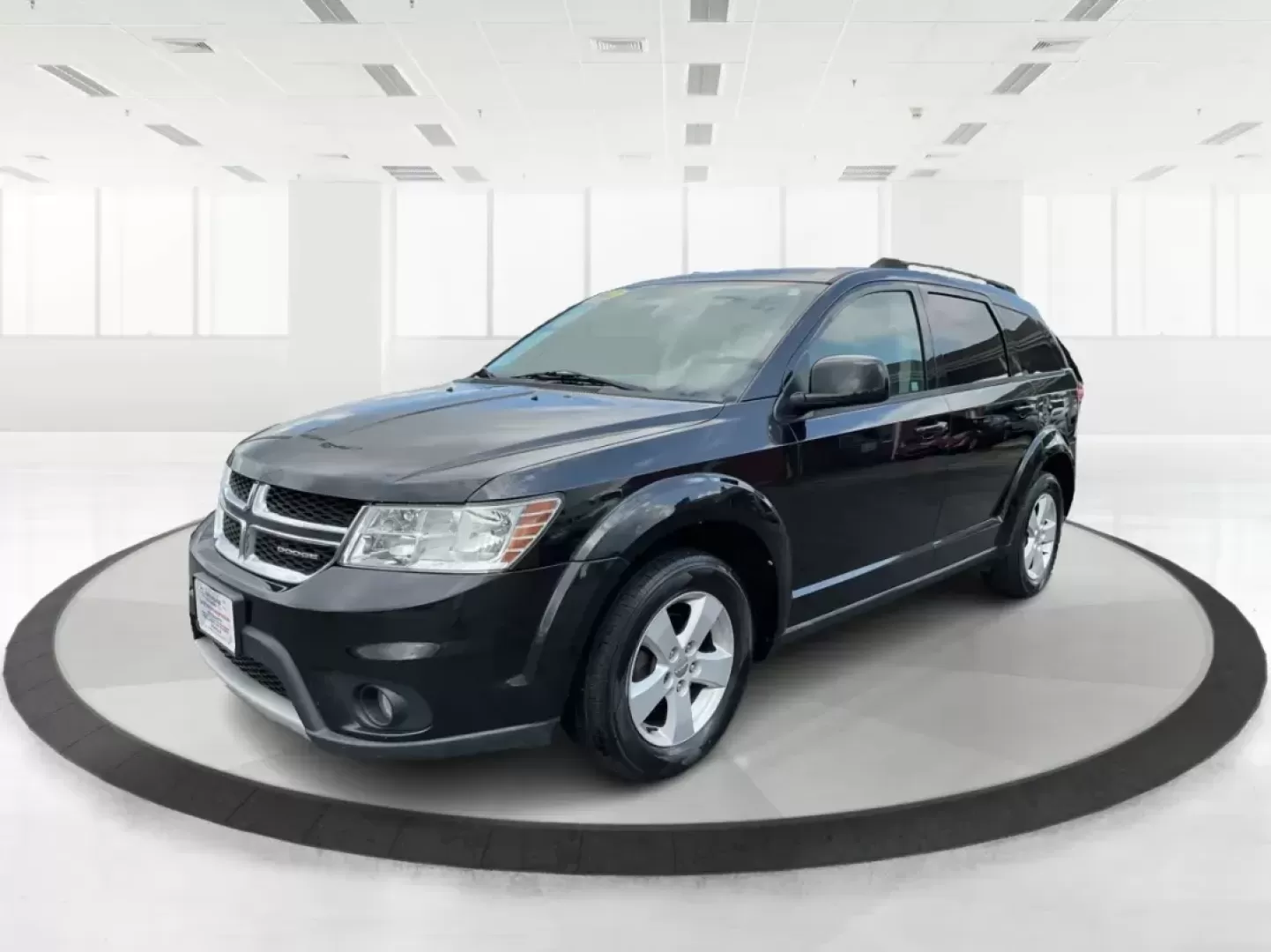 2012 Dodge Journey SXT (3C4PDCBG5CT) with an 2.4L I-4 DOHC engine, located at 401 Woodman Dr, Riverside, OH, 45431, (937) 908-9800, 39.760899, -84.123421 - 2012 Dodge Journey SXT - Photo#7