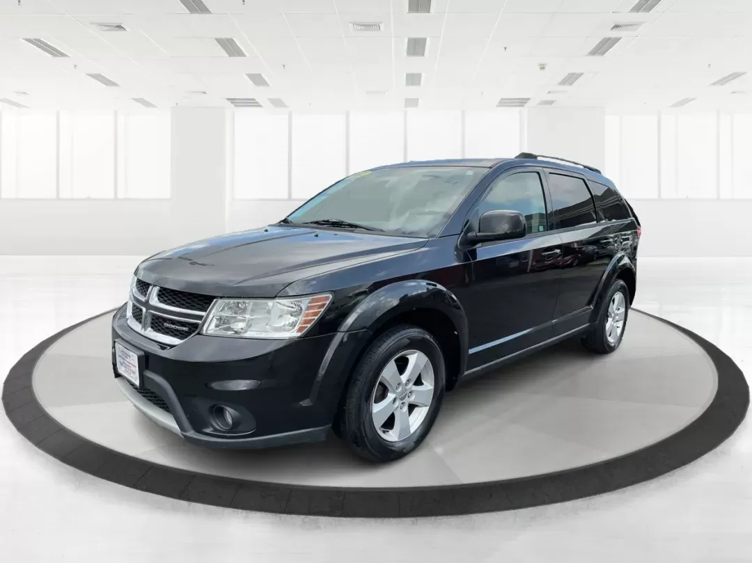 2012 Dodge Journey SXT (3C4PDCBG5CT) with an 2.4L I-4 DOHC engine, located at 401 Woodman Dr, Riverside, OH, 45431, (937) 908-9800, 39.760899, -84.123421 - Photo#7