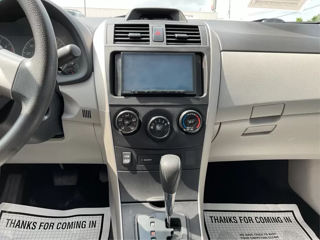2012 Toyota Corolla LE (2T1BU4EEXCC) with an 1.8L I-4 DOHC engine, located at 401 Woodman Dr, Riverside, OH, 45431, (937) 908-9800, 39.760899, -84.123421 - Photo#12