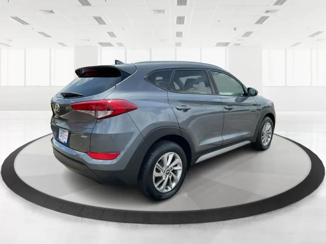 2018 Hyundai Tucson SEL (KM8J3CA44JU) with an Nu 2L I-4 gasoline direct injection engine, located at 1184 Kauffman Ave, Fairborn, OH, 45324, (937) 908-9800, 39.807072, -84.030914 - Photo#2