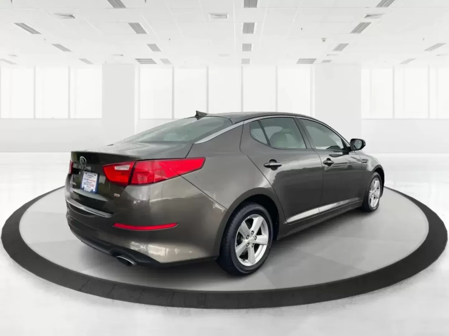 2014 Kia Optima LX (5XXGM4A77EG) with an Theta II 2.4L I-4 gasoline direct injection engine, located at 401 Woodman Dr, Riverside, OH, 45431, (937) 908-9800, 39.760899, -84.123421 - 2014 Kia Optima LX - Photo#2