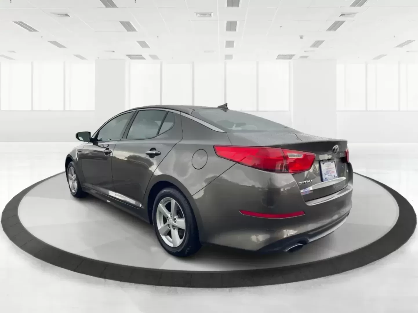 2014 Kia Optima LX (5XXGM4A77EG) with an Theta II 2.4L I-4 gasoline direct injection engine, located at 401 Woodman Dr, Riverside, OH, 45431, (937) 908-9800, 39.760899, -84.123421 - 2014 Kia Optima LX - Photo#4