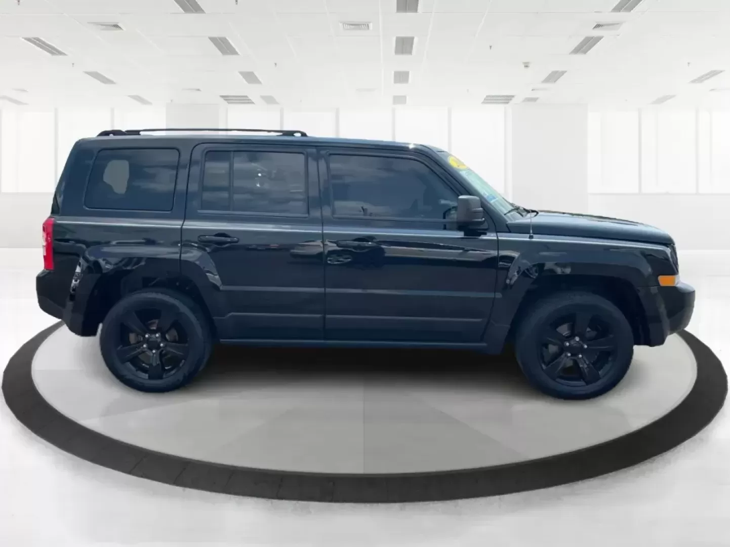 2015 Jeep Patriot Altitude Edition (1C4NJRBB1FD) with an 2.4L I-4 DOHC engine, located at 880 E. National Road, Vandalia, OH, 45377, (937) 908-9800, 39.891918, -84.183594 - 2015 Jeep Patriot Altitude Edition - Photo#1