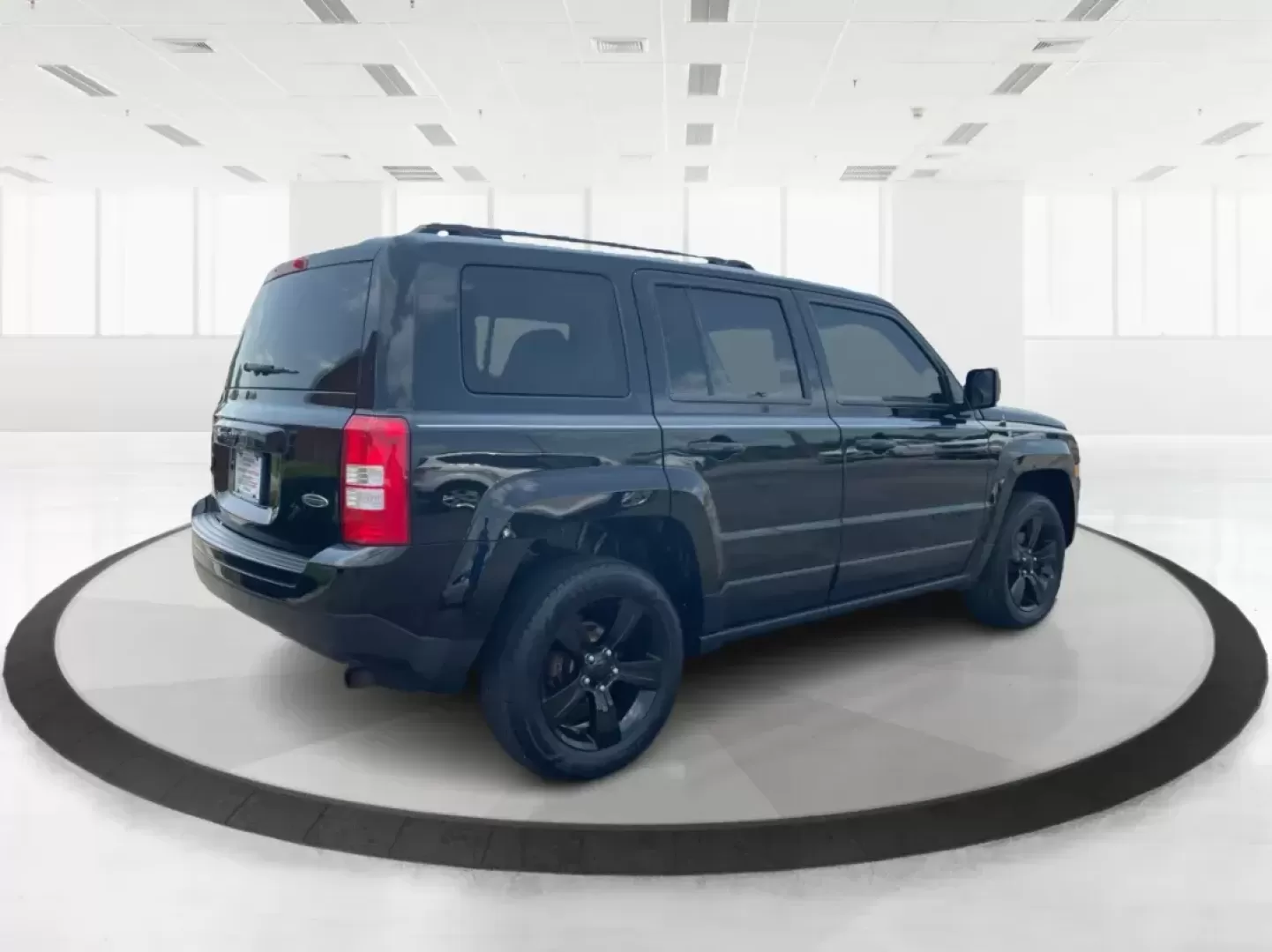 2015 Jeep Patriot Altitude Edition (1C4NJRBB1FD) with an 2.4L I-4 DOHC engine, located at 880 E. National Road, Vandalia, OH, 45377, (937) 908-9800, 39.891918, -84.183594 - 2015 Jeep Patriot Altitude Edition - Photo#2