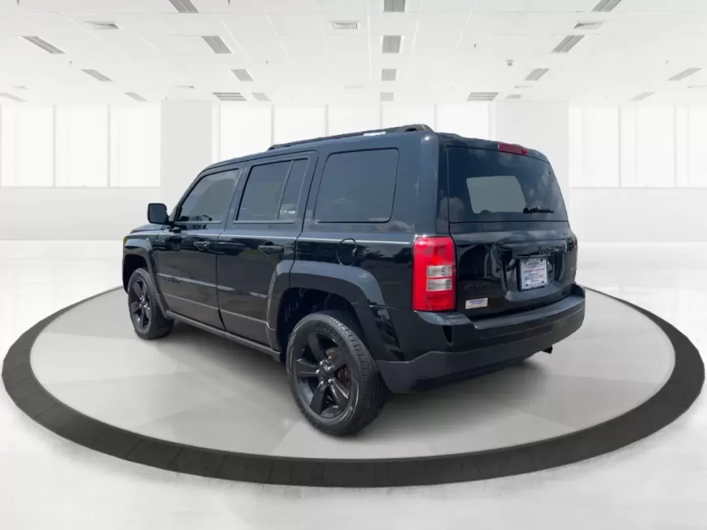 2015 Jeep Patriot Altitude Edition (1C4NJRBB1FD) with an 2.4L I-4 DOHC engine, located at 880 E. National Road, Vandalia, OH, 45377, (937) 908-9800, 39.891918, -84.183594 - 2015 Jeep Patriot Altitude Edition - Photo#4