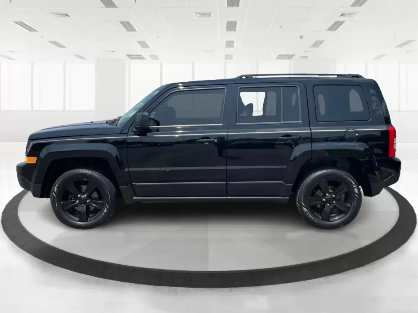 2015 Jeep Patriot Altitude Edition (1C4NJRBB1FD) with an 2.4L I-4 DOHC engine, located at 880 E. National Road, Vandalia, OH, 45377, (937) 908-9800, 39.891918, -84.183594 - 2015 Jeep Patriot Altitude Edition - Photo#5