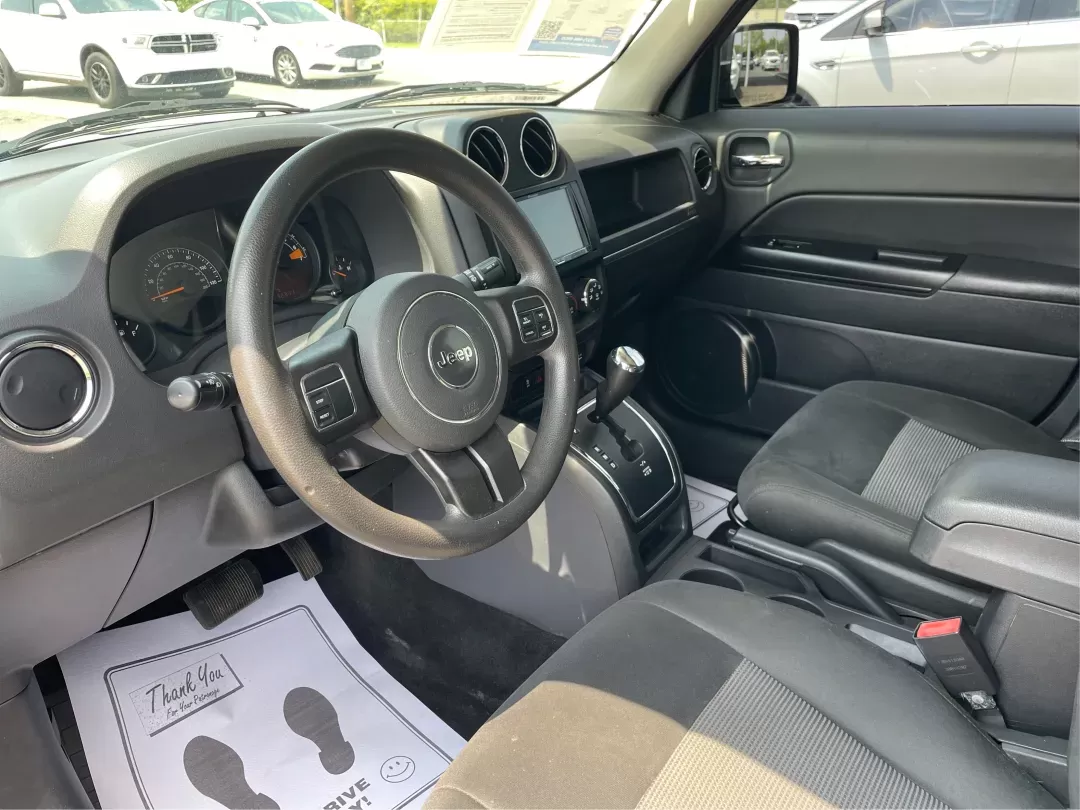 2015 Jeep Patriot Altitude Edition (1C4NJRBB1FD) with an 2.4L I-4 DOHC engine, located at 880 E. National Road, Vandalia, OH, 45377, (937) 908-9800, 39.891918, -84.183594 - 2015 Jeep Patriot Altitude Edition - Photo#8