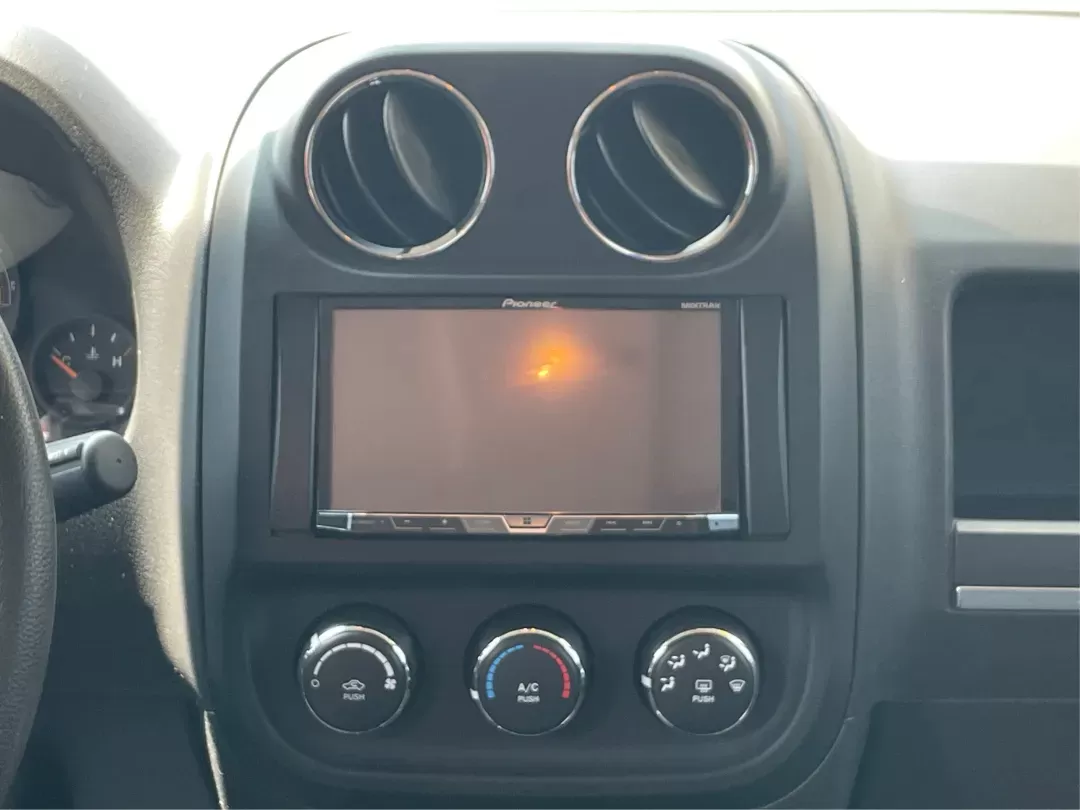 2015 Jeep Patriot Altitude Edition (1C4NJRBB1FD) with an 2.4L I-4 DOHC engine, located at 880 E. National Road, Vandalia, OH, 45377, (937) 908-9800, 39.891918, -84.183594 - 2015 Jeep Patriot Altitude Edition - Photo#12
