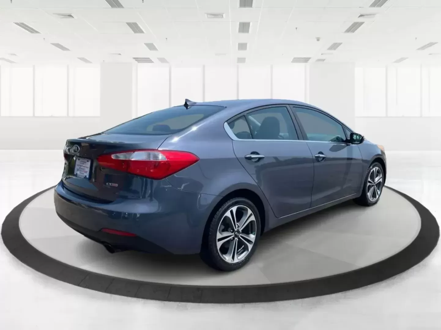 2014 Kia Forte EX (KNAFX4A88E5) with an 2L I-4 gasoline direct injection engine, located at 8750 N County Rd 25A, Piqua, OH, 45356, (937) 908-9800, 40.164391, -84.232513 - 2014 Kia Forte EX - Photo#2
