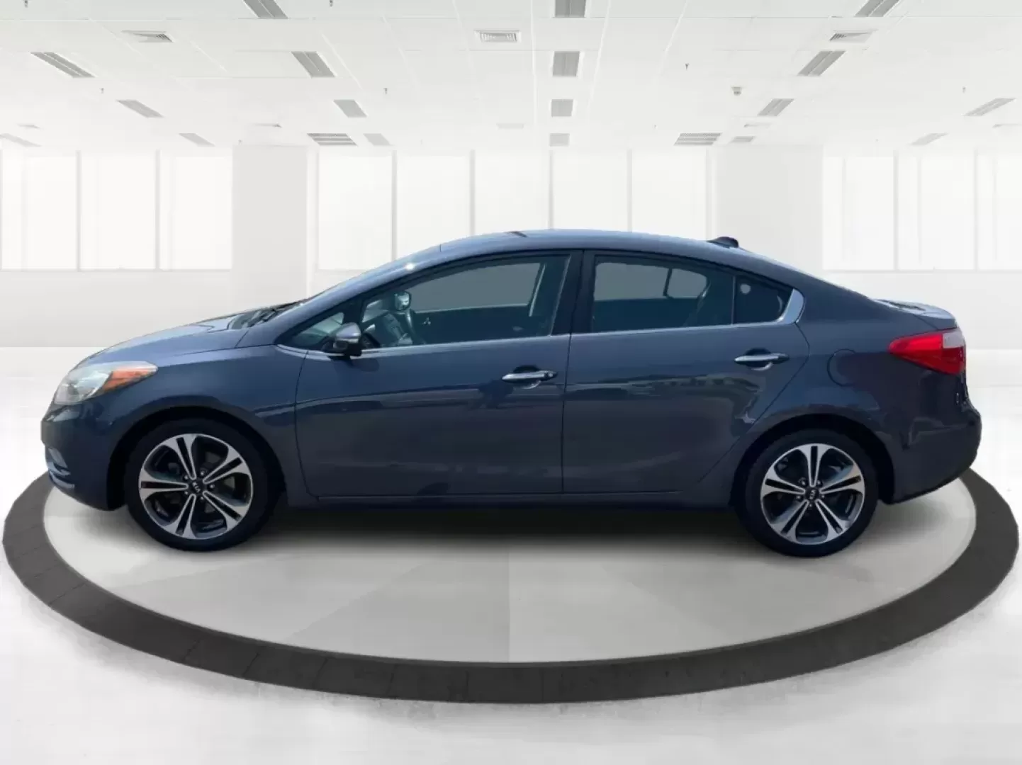 2014 Kia Forte EX (KNAFX4A88E5) with an 2L I-4 gasoline direct injection engine, located at 8750 N County Rd 25A, Piqua, OH, 45356, (937) 908-9800, 40.164391, -84.232513 - 2014 Kia Forte EX - Photo#5