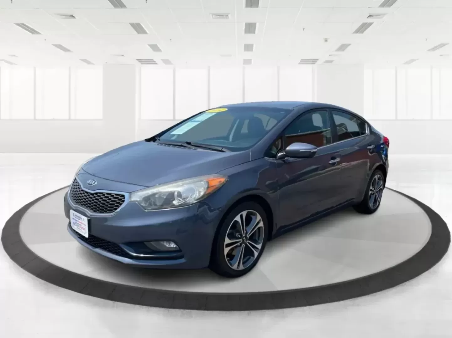 2014 Kia Forte EX (KNAFX4A88E5) with an 2L I-4 gasoline direct injection engine, located at 8750 N County Rd 25A, Piqua, OH, 45356, (937) 908-9800, 40.164391, -84.232513 - 2014 Kia Forte EX - Photo#7