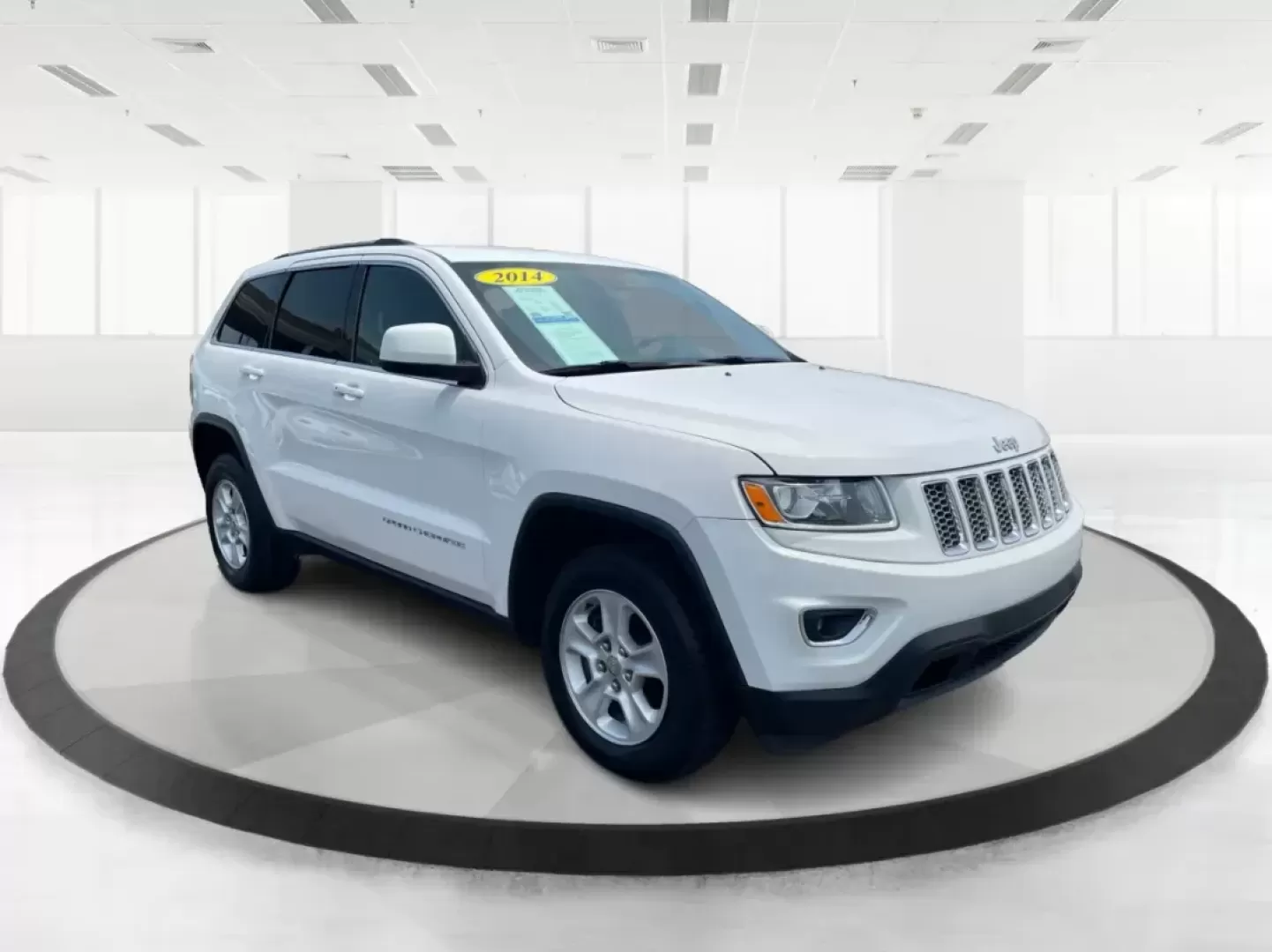 2014 Jeep Grand Cherokee Laredo (1C4RJFAGXEC) with an 3.6L V-6 DOHC engine, located at 880 E. National Road, Vandalia, OH, 45377, (937) 908-9800, 39.891918, -84.183594 - 2014 Jeep Grand Cherokee Laredo - Photo#0