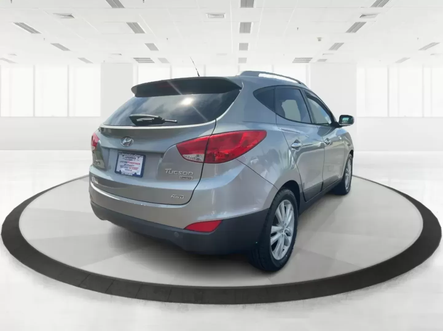 2013 Hyundai Tucson Limited (KM8JUCAC4DU) with an Other engine, located at 1184 Kauffman Ave, Fairborn, OH, 45324, (937) 908-9800, 39.807072, -84.030914 - 2013 Hyundai Tucson Limited - Photo#2