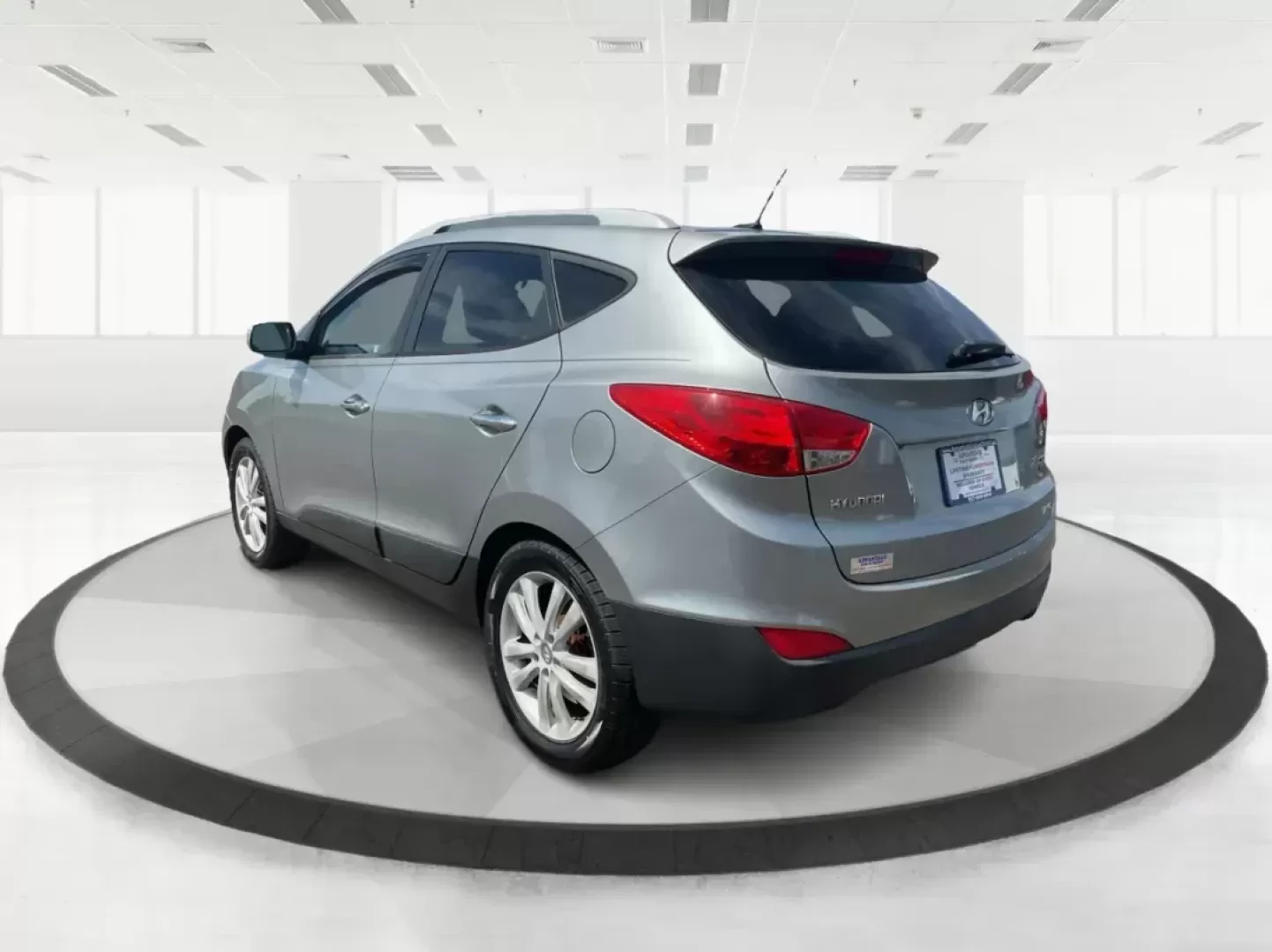 2013 Hyundai Tucson Limited (KM8JUCAC4DU) with an Other engine, located at 1184 Kauffman Ave, Fairborn, OH, 45324, (937) 908-9800, 39.807072, -84.030914 - 2013 Hyundai Tucson Limited - Photo#4