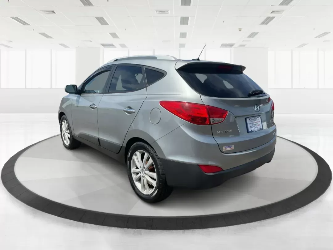 2013 Hyundai Tucson Limited (KM8JUCAC4DU) with an Other engine, located at 1184 Kauffman Ave, Fairborn, OH, 45324, (937) 908-9800, 39.807072, -84.030914 - Photo#4