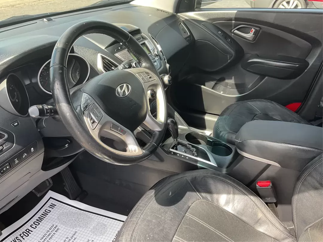 2013 Hyundai Tucson Limited (KM8JUCAC4DU) with an Other engine, located at 1184 Kauffman Ave, Fairborn, OH, 45324, (937) 908-9800, 39.807072, -84.030914 - Photo#8