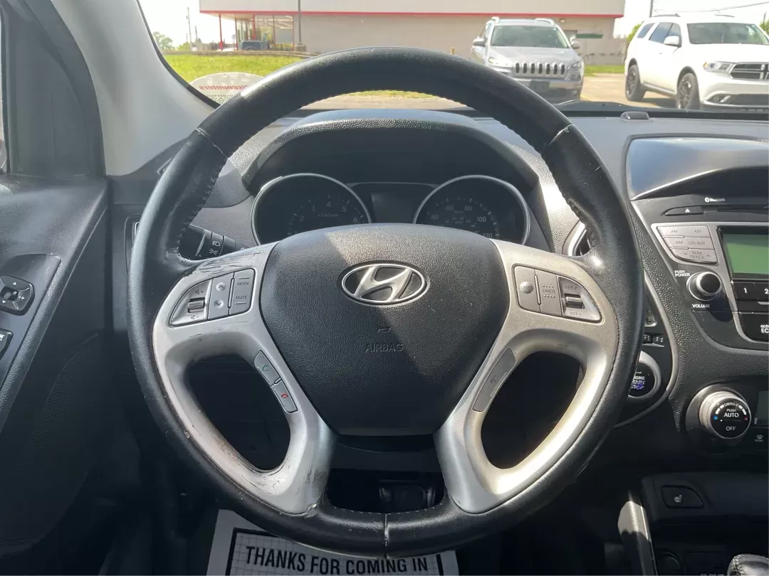 2013 Hyundai Tucson Limited (KM8JUCAC4DU) with an Other engine, located at 1184 Kauffman Ave, Fairborn, OH, 45324, (937) 908-9800, 39.807072, -84.030914 - Photo#15
