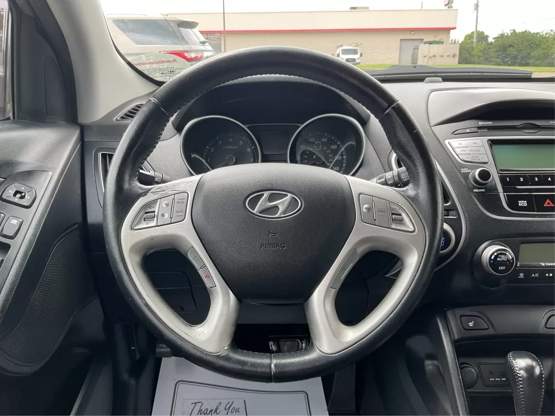 2013 Hyundai Tucson Limited (KM8JUCAC4DU) with an Other engine, located at 1230 East Main St, Xenia, OH, 45385, (937) 908-9800, 39.688026, -83.910172 - **Discover Your New Adventure Vehicle: 2013 Hyundai Tucson Limited at Advantage Car and Credit!** <br /> <br /> Are you searching for the perfect SUV that combines style, comfort, and versatility? Look no further than this striking 2013 Hyundai Tucson Limited, located right here at Advantage Car an - Photo#13