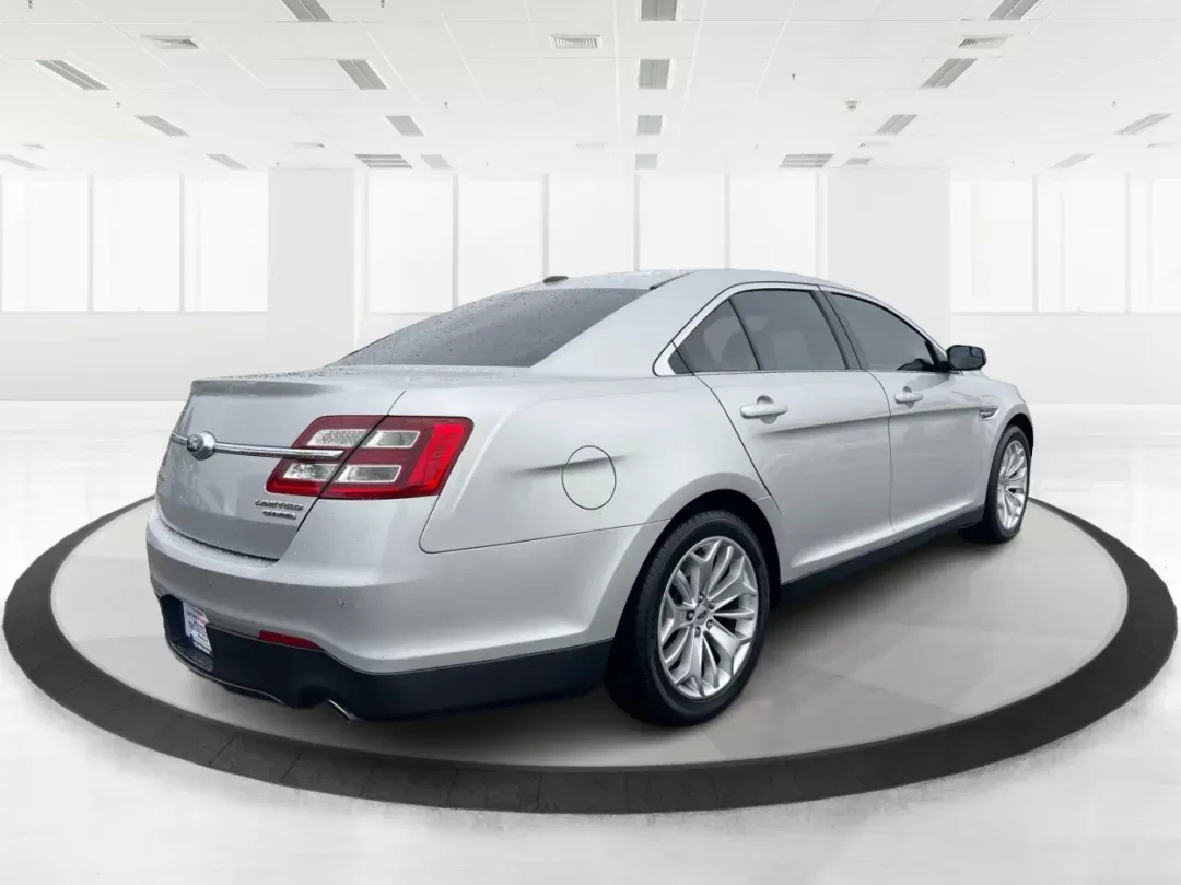2016 Ford Taurus Limited (1FAHP2F82GG) with an EcoBoost 2L I-4 gasoline direct injection engine, located at 8750 N County Rd 25A, Piqua, OH, 45356, (937) 908-9800, 40.164391, -84.232513 - **Experience the Ultimate in Comfort and Style with the 2016 Ford Taurus Limited at Advantage Car and Credit!**<br /> <br /> Are you searching for a reliable sedan that seamlessly fits into your busy lifestyle? Whether you're commuting to work, taking the kids to soccer practice, or planning a weeke - Photo#2