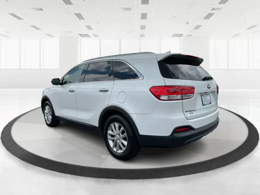 2016 Kia Sorento 2.4L LX (5XYPG4A39GG) with an 2.4L I-4 gasoline direct injection engine, located at 401 Woodman Dr, Riverside, OH, 45431, (937) 908-9800, 39.760899, -84.123421 - Photo#4