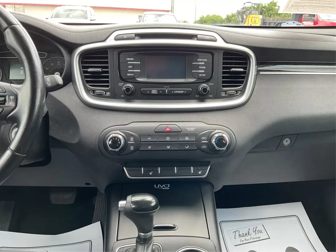 2016 Kia Sorento 2.4L LX (5XYPG4A39GG) with an 2.4L I-4 gasoline direct injection engine, located at 401 Woodman Dr, Riverside, OH, 45431, (937) 908-9800, 39.760899, -84.123421 - Photo#12