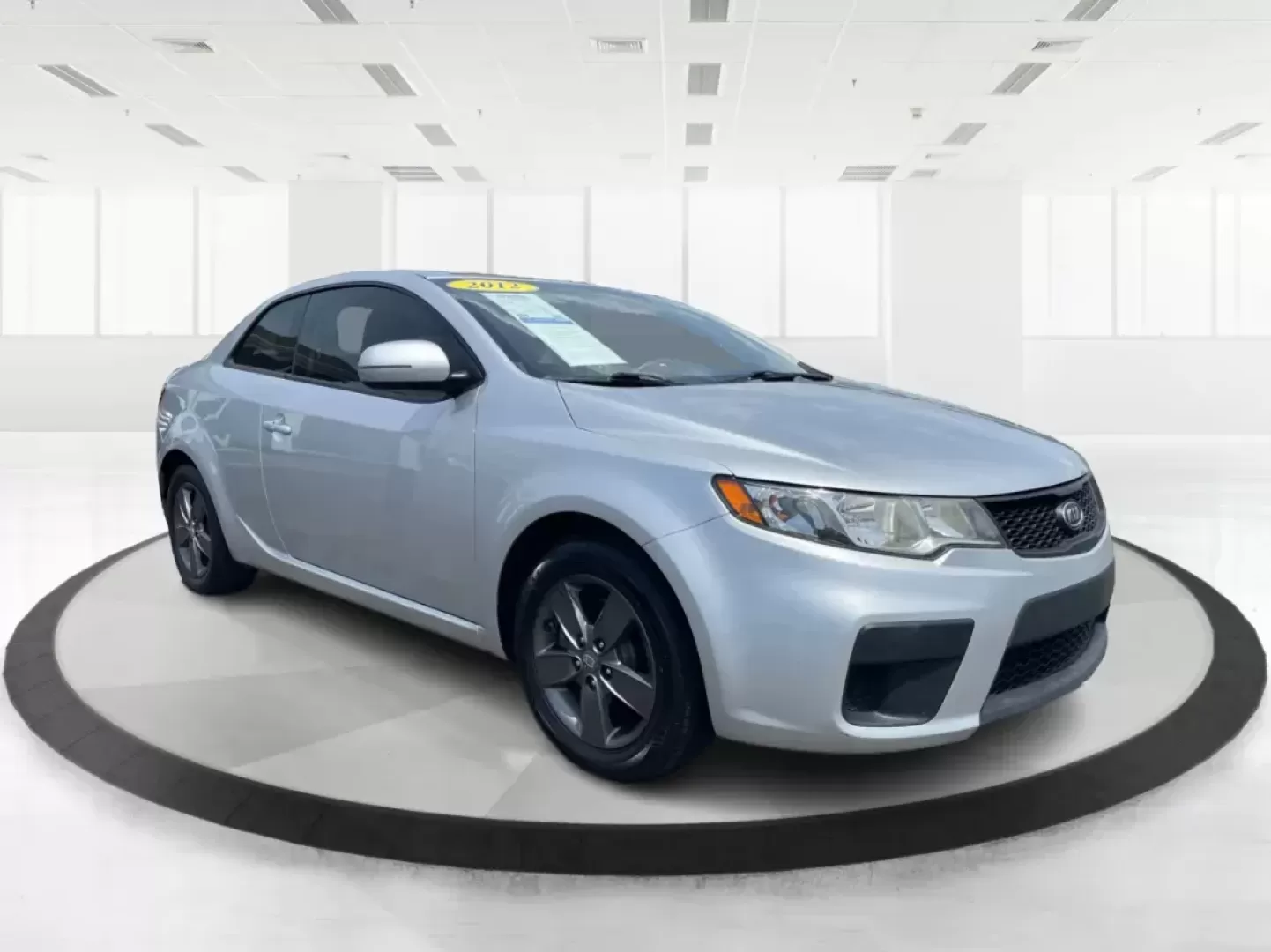 2012 Kia Forte Koup EX (KNAFU6A20C5) with an 2L I-4 DOHC engine, located at 8750 N County Rd 25A, Piqua, OH, 45356, (937) 908-9800, 40.164391, -84.232513 - **Unleash Your Driving Potential with the 2012 Kia Forte Koup EX at Advantage Car and Credit!**<br /> <br /> Are you ready to elevate your daily commute or weekend adventures in Fairborn, OH? The 2012 Kia Forte Koup EX is your ticket to an exciting driving experience that balances sportiness and pra - Photo#0