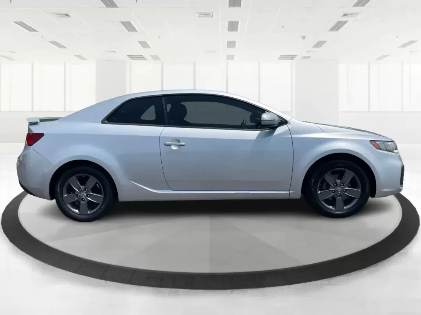 2012 Kia Forte Koup EX (KNAFU6A20C5) with an 2L I-4 DOHC engine, located at 8750 N County Rd 25A, Piqua, OH, 45356, (937) 908-9800, 40.164391, -84.232513 - **Unleash Your Driving Potential with the 2012 Kia Forte Koup EX at Advantage Car and Credit!**<br /> <br /> Are you ready to elevate your daily commute or weekend adventures in Fairborn, OH? The 2012 Kia Forte Koup EX is your ticket to an exciting driving experience that balances sportiness and pra - Photo#1