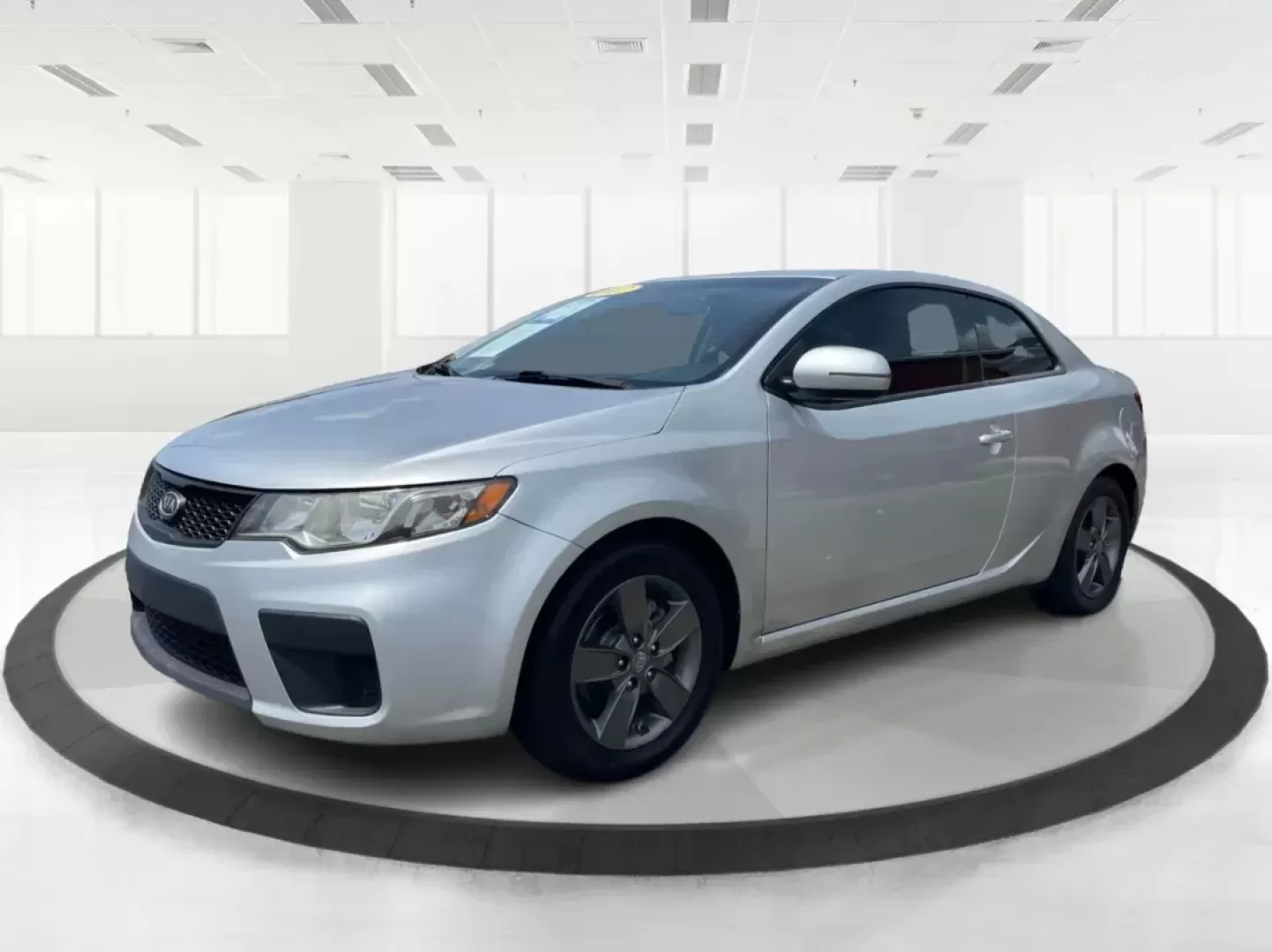 2012 Kia Forte Koup EX (KNAFU6A20C5) with an 2L I-4 DOHC engine, located at 8750 N County Rd 25A, Piqua, OH, 45356, (937) 908-9800, 40.164391, -84.232513 - **Unleash Your Driving Potential with the 2012 Kia Forte Koup EX at Advantage Car and Credit!**<br /> <br /> Are you ready to elevate your daily commute or weekend adventures in Fairborn, OH? The 2012 Kia Forte Koup EX is your ticket to an exciting driving experience that balances sportiness and pra - Photo#7