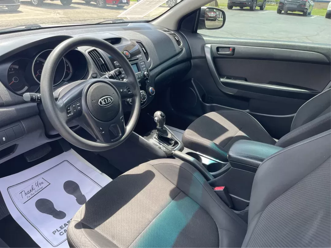 2012 Kia Forte Koup EX (KNAFU6A20C5) with an 2L I-4 DOHC engine, located at 8750 N County Rd 25A, Piqua, OH, 45356, (937) 908-9800, 40.164391, -84.232513 - **Unleash Your Driving Potential with the 2012 Kia Forte Koup EX at Advantage Car and Credit!**<br /> <br /> Are you ready to elevate your daily commute or weekend adventures in Fairborn, OH? The 2012 Kia Forte Koup EX is your ticket to an exciting driving experience that balances sportiness and pra - Photo#8