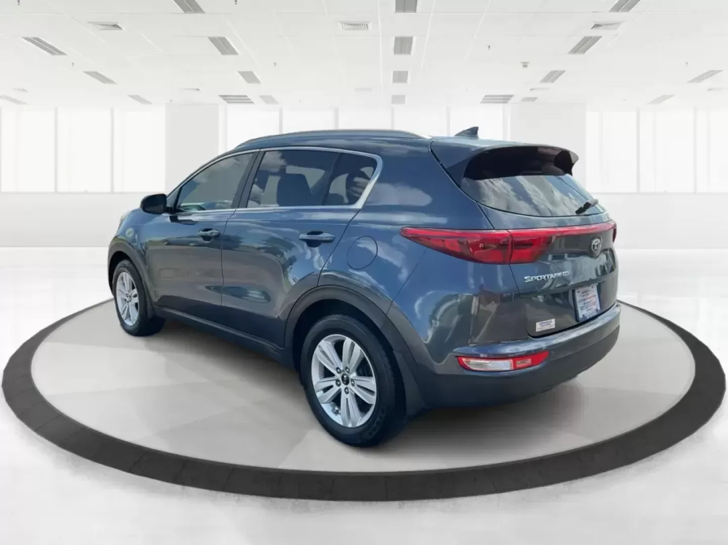 2017 Kia Sportage LX (KNDPM3ACXH7) with an Theta II 2.4L I-4 gasoline direct injection engine, located at 8750 N County Rd 25A, Piqua, OH, 45356, (937) 908-9800, 40.164391, -84.232513 - Photo#4