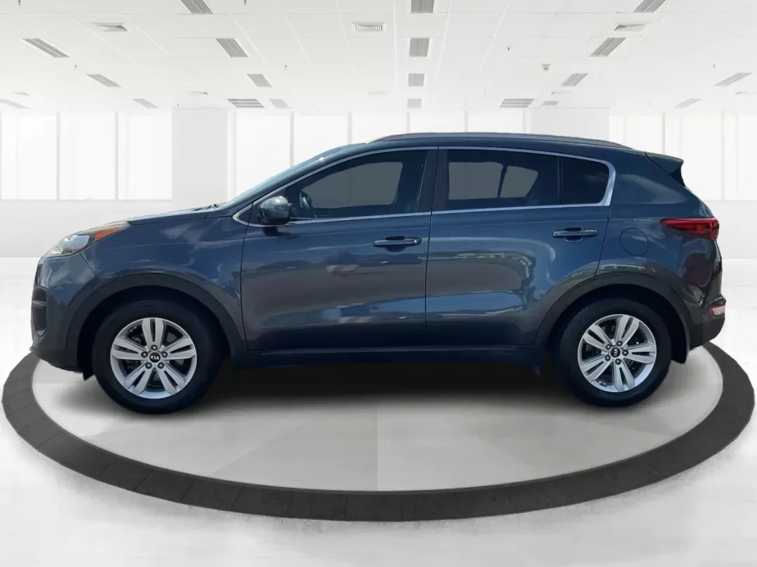 2017 Kia Sportage LX (KNDPM3ACXH7) with an Theta II 2.4L I-4 gasoline direct injection engine, located at 8750 N County Rd 25A, Piqua, OH, 45356, (937) 908-9800, 40.164391, -84.232513 - **Explore the Open Road in the 2017 Kia Sportage LX: Your Ideal Crossover for Every Adventure!**<br /> <br /> Are you ready to transform your daily commute or weekend getaway? The 2017 Kia Sportage LX, available now at Advantage Car and Credit in Fairborn, OH, is not just a vehicle; it's your ticket - Photo#5