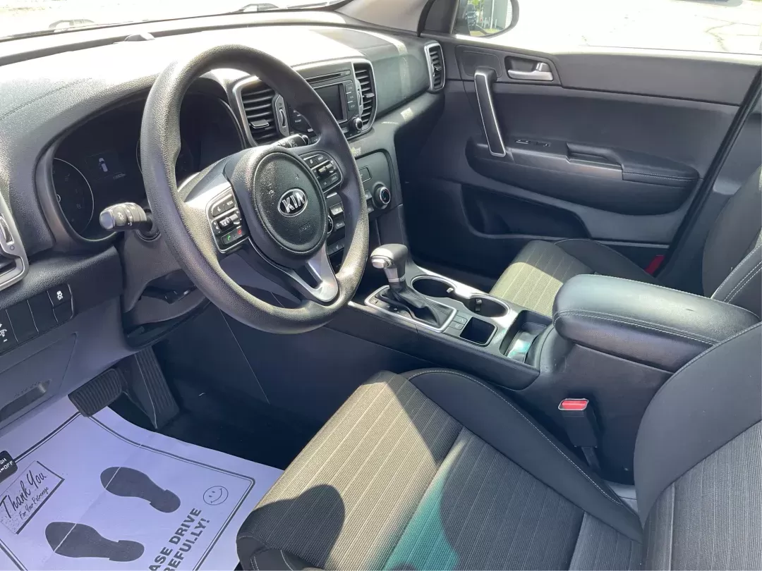 2017 Kia Sportage LX (KNDPM3ACXH7) with an Theta II 2.4L I-4 gasoline direct injection engine, located at 8750 N County Rd 25A, Piqua, OH, 45356, (937) 908-9800, 40.164391, -84.232513 - **Explore the Open Road in the 2017 Kia Sportage LX: Your Ideal Crossover for Every Adventure!**<br /> <br /> Are you ready to transform your daily commute or weekend getaway? The 2017 Kia Sportage LX, available now at Advantage Car and Credit in Fairborn, OH, is not just a vehicle; it's your ticket - Photo#8