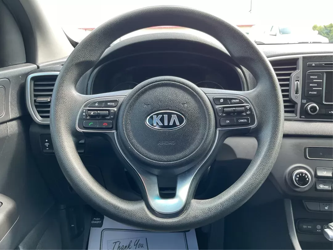 2017 Kia Sportage LX (KNDPM3ACXH7) with an Theta II 2.4L I-4 gasoline direct injection engine, located at 8750 N County Rd 25A, Piqua, OH, 45356, (937) 908-9800, 40.164391, -84.232513 - **Explore the Open Road in the 2017 Kia Sportage LX: Your Ideal Crossover for Every Adventure!**<br /> <br /> Are you ready to transform your daily commute or weekend getaway? The 2017 Kia Sportage LX, available now at Advantage Car and Credit in Fairborn, OH, is not just a vehicle; it's your ticket - Photo#15