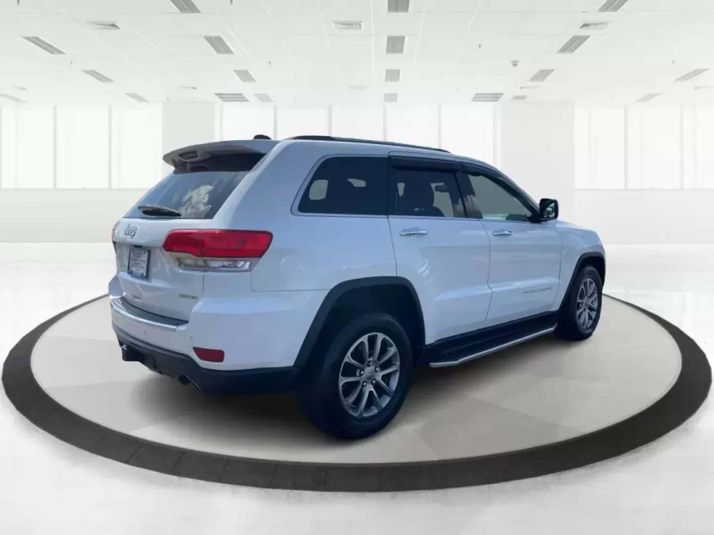 2014 Jeep Grand Cherokee Limited (1C4RJFBG6EC) with an Other engine, located at 8750 N County Rd 25A, Piqua, OH, 45356, (937) 908-9800, 40.164391, -84.232513 - Photo#2