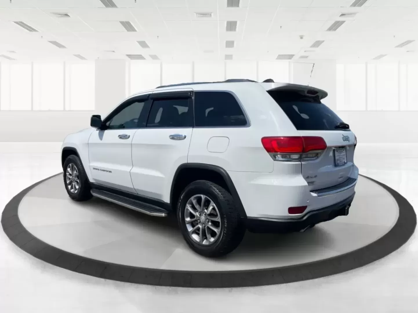 2014 Jeep Grand Cherokee Limited (1C4RJFBG6EC) with an Other engine, located at 8750 N County Rd 25A, Piqua, OH, 45356, (937) 908-9800, 40.164391, -84.232513 - Photo#4