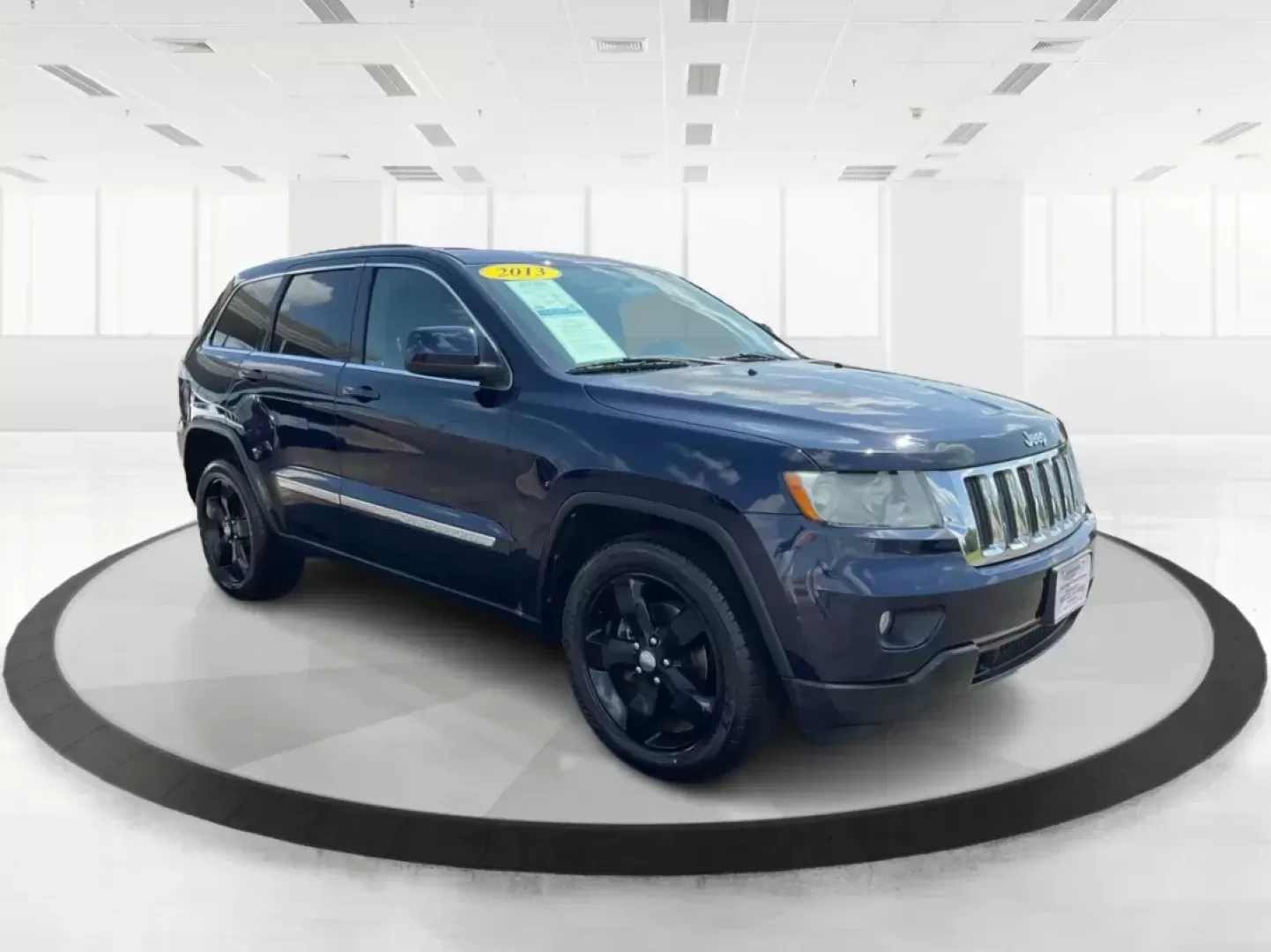 2013 Jeep Grand Cherokee Laredo (1C4RJFAG7DC) with an Other engine, located at 1951 S Dayton Lakeview Rd., New Carlisle, OH, 45344, (937) 908-9800, 39.890999, -84.050255 - **Unleash Adventure with the 2013 Jeep Grand Cherokee Laredo Your Perfect SUV Awaits!**<br /> <br /> Are you ready to elevate your lifestyle and embrace thrilling weekend adventures? The 2013 Jeep Grand Cherokee Laredo, available at Advantage Car and Credit in Fairborn, OH, is the ideal vehicle for - Photo#0
