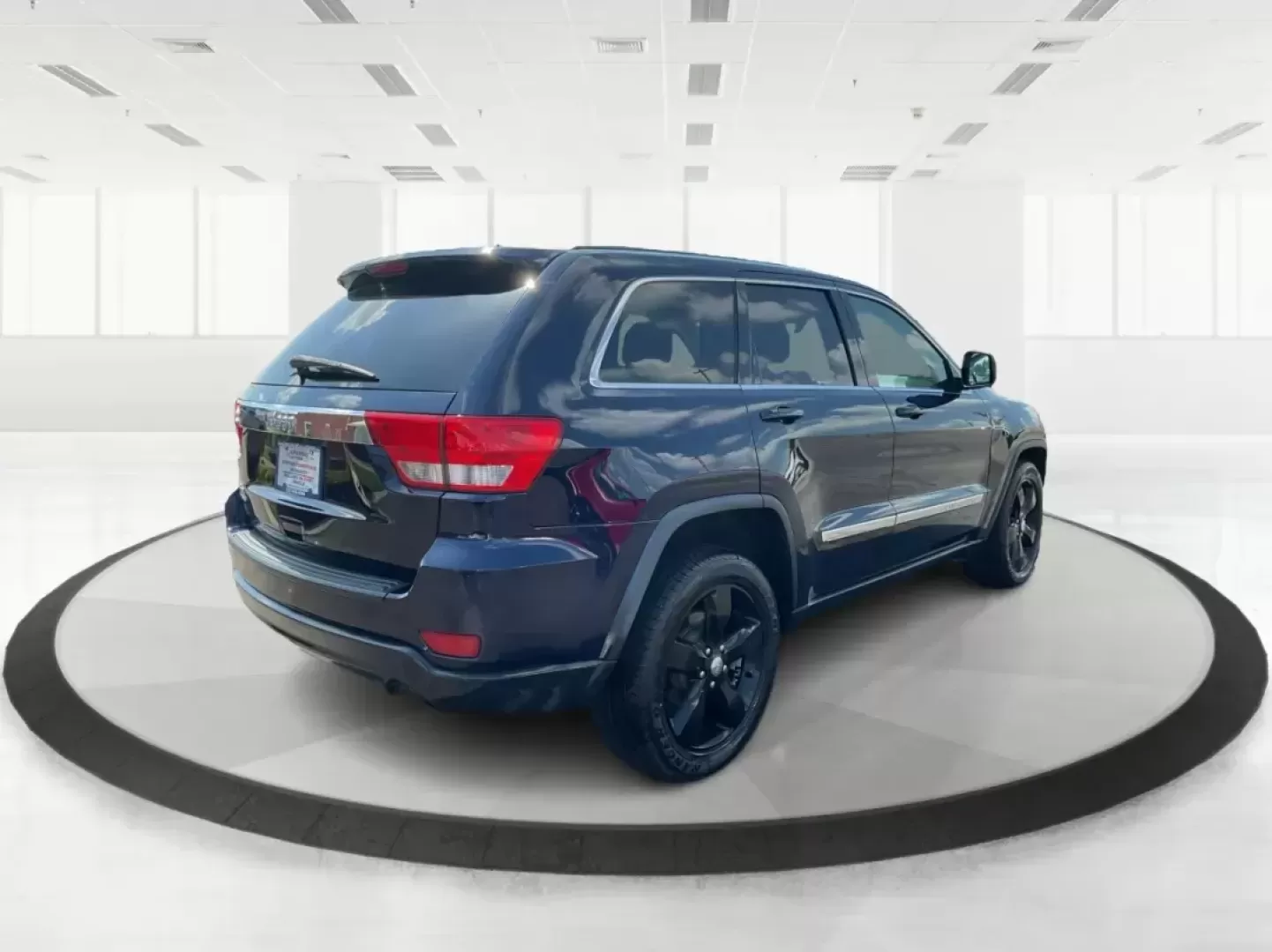 2013 Jeep Grand Cherokee Laredo (1C4RJFAG7DC) with an Other engine, located at 1951 S Dayton Lakeview Rd., New Carlisle, OH, 45344, (937) 908-9800, 39.890999, -84.050255 - **Unleash Adventure with the 2013 Jeep Grand Cherokee Laredo Your Perfect SUV Awaits!**<br /> <br /> Are you ready to elevate your lifestyle and embrace thrilling weekend adventures? The 2013 Jeep Grand Cherokee Laredo, available at Advantage Car and Credit in Fairborn, OH, is the ideal vehicle for - Photo#2