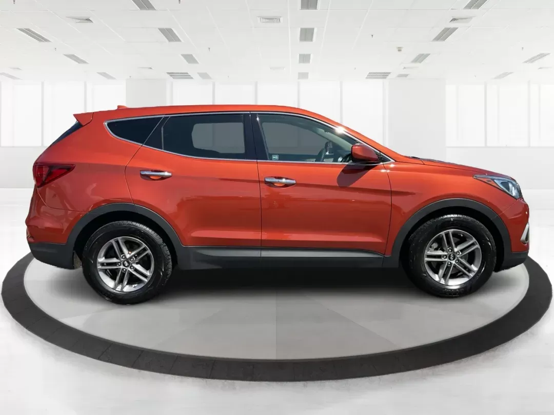 2017 Hyundai Santa Fe Sport 2.4L (5XYZT3LB6HG) with an Theta II 2.4L I-4 gasoline direct injection engine, located at 1184 Kauffman Ave, Fairborn, OH, 45324, (937) 908-9800, 39.807072, -84.030914 - **Experience Adventure and Comfort with the 2017 Hyundai Santa Fe Sport at Advantage Car and Credit!**<br /> <br /> Are you a growing family seeking the perfect blend of space, comfort, and reliability for your daily travels? Look no further than the 2017 Hyundai Santa Fe Sport, available now at Adv - Photo#1
