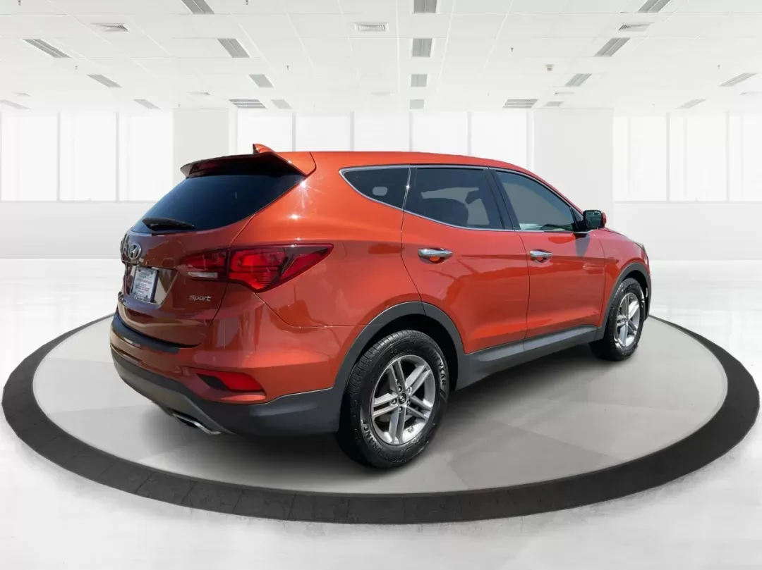 2017 Hyundai Santa Fe Sport 2.4L (5XYZT3LB6HG) with an Theta II 2.4L I-4 gasoline direct injection engine, located at 1184 Kauffman Ave, Fairborn, OH, 45324, (937) 908-9800, 39.807072, -84.030914 - **Experience Adventure and Comfort with the 2017 Hyundai Santa Fe Sport at Advantage Car and Credit!**<br /> <br /> Are you a growing family seeking the perfect blend of space, comfort, and reliability for your daily travels? Look no further than the 2017 Hyundai Santa Fe Sport, available now at Adv - Photo#2
