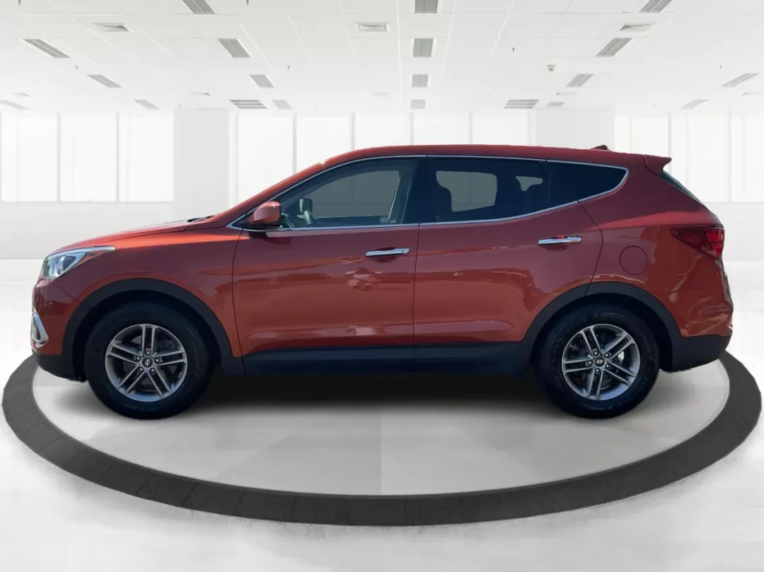 2017 Hyundai Santa Fe Sport 2.4L (5XYZT3LB6HG) with an Theta II 2.4L I-4 gasoline direct injection engine, located at 1184 Kauffman Ave, Fairborn, OH, 45324, (937) 908-9800, 39.807072, -84.030914 - **Experience Adventure and Comfort with the 2017 Hyundai Santa Fe Sport at Advantage Car and Credit!**<br /> <br /> Are you a growing family seeking the perfect blend of space, comfort, and reliability for your daily travels? Look no further than the 2017 Hyundai Santa Fe Sport, available now at Adv - Photo#5
