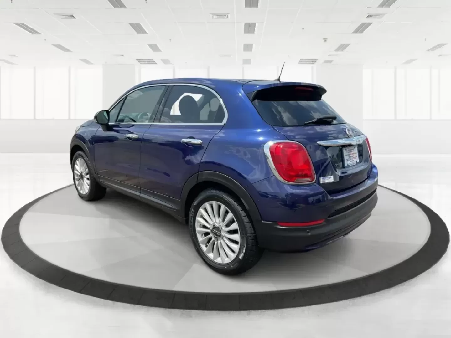 2016 FIAT 500X Lounge (ZFBCFYDT9GP) with an MultiAir 2.4L I-4 variable valve control engine, located at 8750 N County Rd 25A, Piqua, OH, 45356, (937) 908-9800, 40.164391, -84.232513 - Photo#4