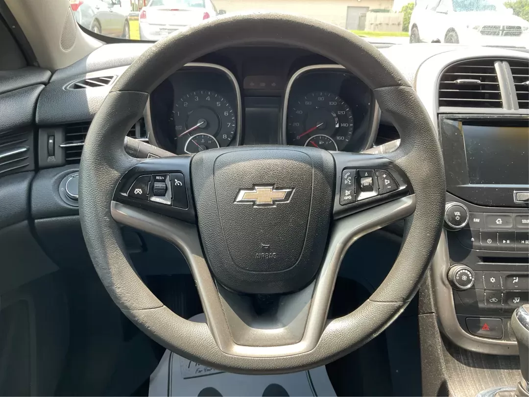 2015 Chevrolet Malibu 1LT (1G11C5SL6FF) with an ECOTEC 2.5L I-4 gasoline direct injection engine, located at 4508 South Dixie Dr, Moraine, OH, 45439, (937) 908-9800, 39.689976, -84.218452 - **Discover Your Perfect Ride: 2015 Chevrolet Malibu 1LT at Advantage Car and Credit in Fairborn, OH!**<br /> <br /> Are you on the hunt for a dependable sedan that balances style, comfort, and efficiency? Look no further than this 2015 Chevrolet Malibu 1LT, ideal for commuters, growing families, or - Photo#15