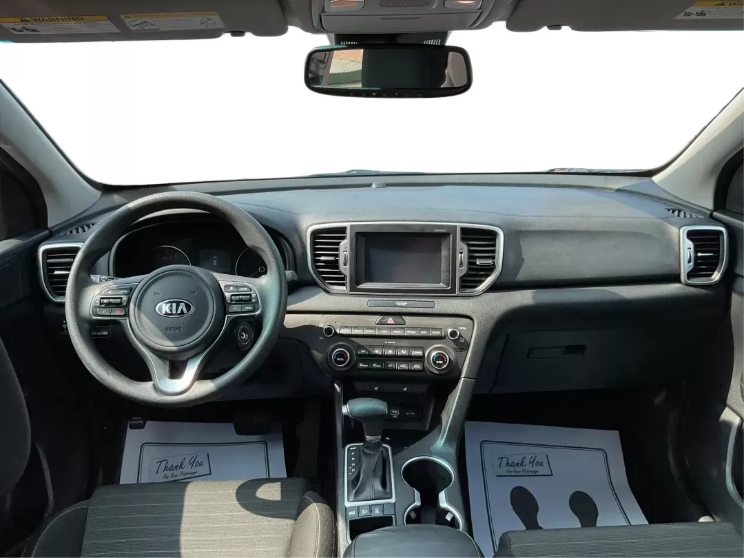 2017 Kia Sportage LX (KNDPMCAC7H7) with an Theta II 2.4L I-4 gasoline direct injection engine, located at 880 E. National Road, Vandalia, OH, 45377, (937) 908-9800, 39.891918, -84.183594 - Photo#19