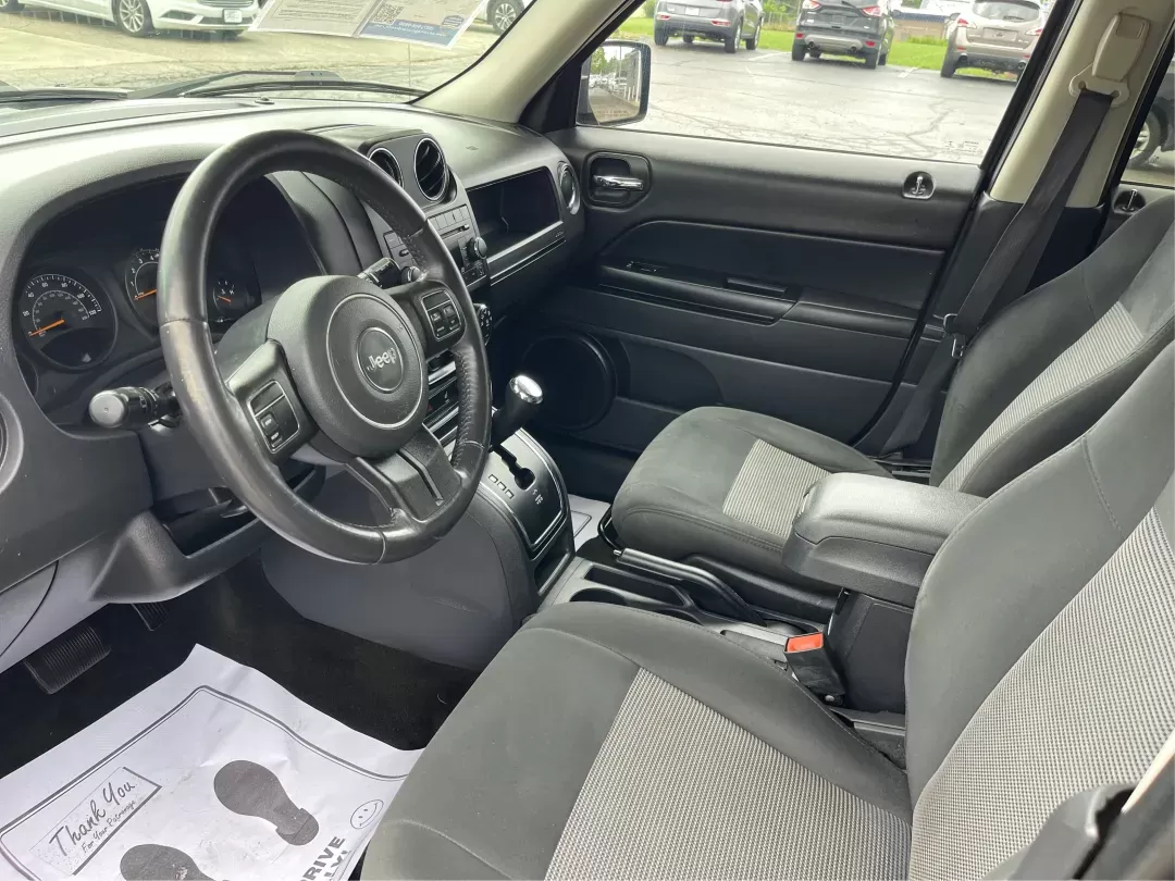 2016 Jeep Patriot Latitude (1C4NJRFBXGD) with an 2.4L I-4 DOHC engine, located at 1184 Kauffman Ave, Fairborn, OH, 45324, (937) 908-9800, 39.807072, -84.030914 - **Explore the Open Road with Confidence: 2016 Jeep Patriot Latitude at Advantage Car and Credit**<br /> <br /> Are you ready to embrace your adventurous spirit? The 2016 Jeep Patriot Latitude is not just a vehicle; it's your gateway to unforgettable road trips, weekend getaways, and everyday journey - Photo#7