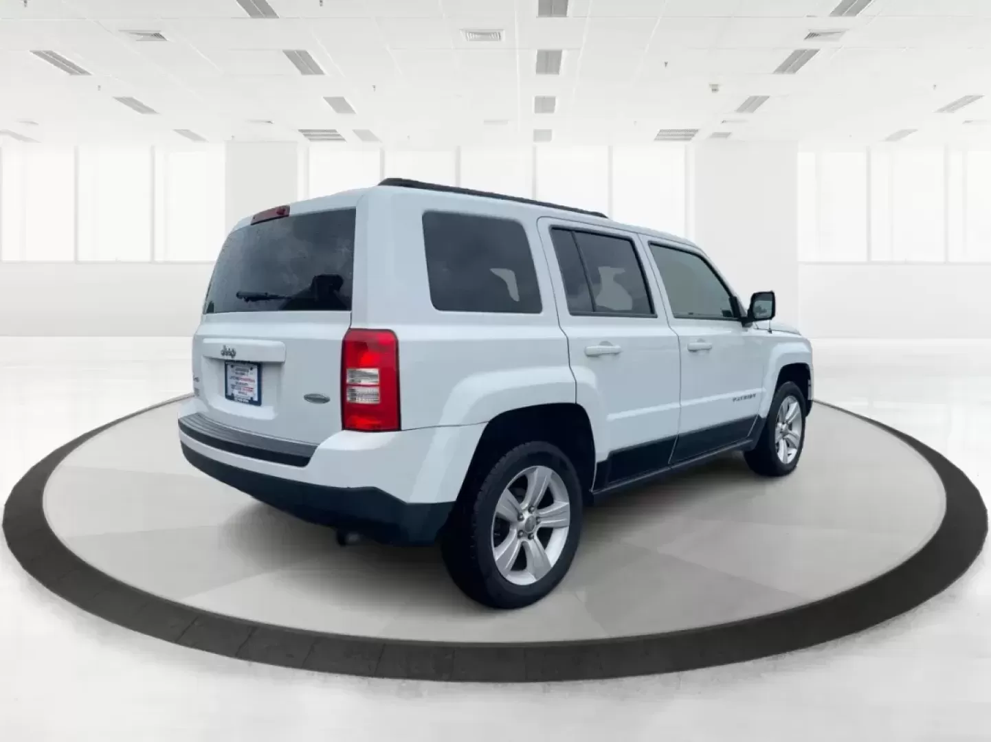 2015 Jeep Patriot Latitude (1C4NJRFB0FD) with an 2.4L I-4 DOHC engine, located at 4508 South Dixie Dr, Moraine, OH, 45439, (937) 908-9800, 39.689976, -84.218452 - Photo#2